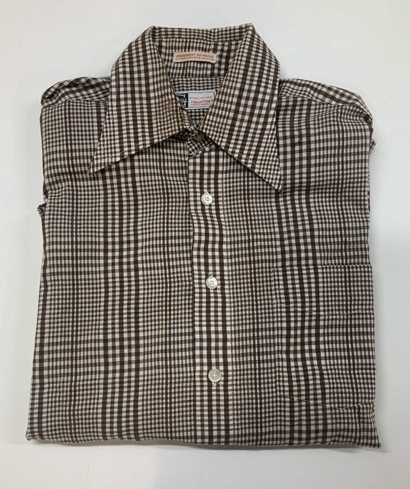 Vntg Gimbles and Creighton plaid button shirt: Vintage Gimbels and Creighton plaid button down shirt. The shirt has a dagger collar design, the collar spans further across the shoulders than a standard one and has internal collar stays to keep it