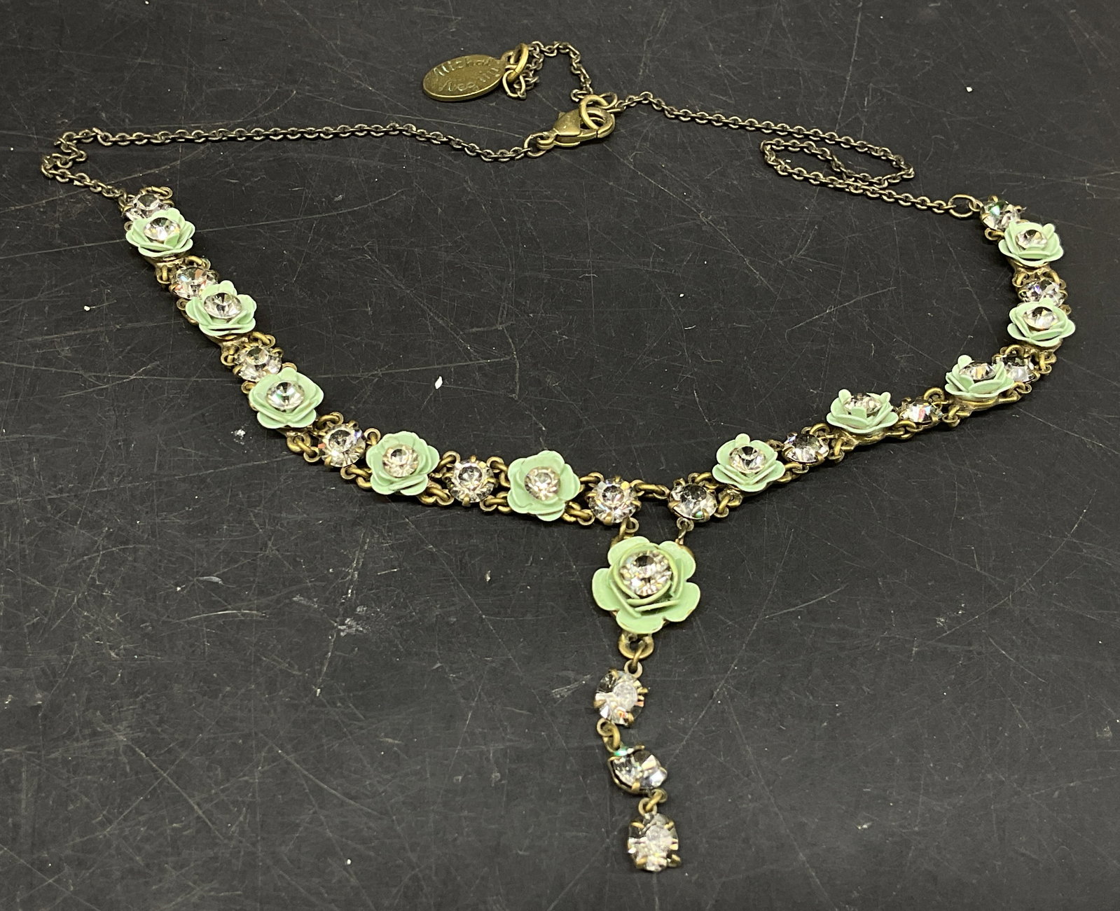 Michael Negrin Swarovski Crystal Necklace: Michael Negrin Neo-Victorian Floral Festoon Choker Necklace. Brass-Toned with mint green enamel roses. Clear Swarovski Crystal accents. Some corrosion present. Measures approx 15.5in L. Michael