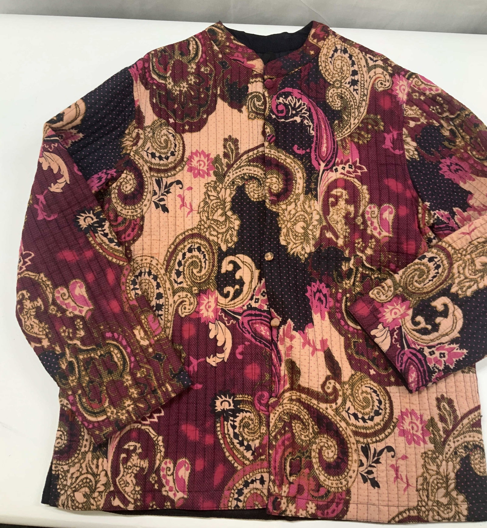 Vntg PHOOL reversible jacket: Vintage PHOOL Reversible jacket. Made from 100% cotton in India, size medium. Jacket is reversible. On one side is a pink paisley pattern while the other side is pain black. Frog button closure, each 