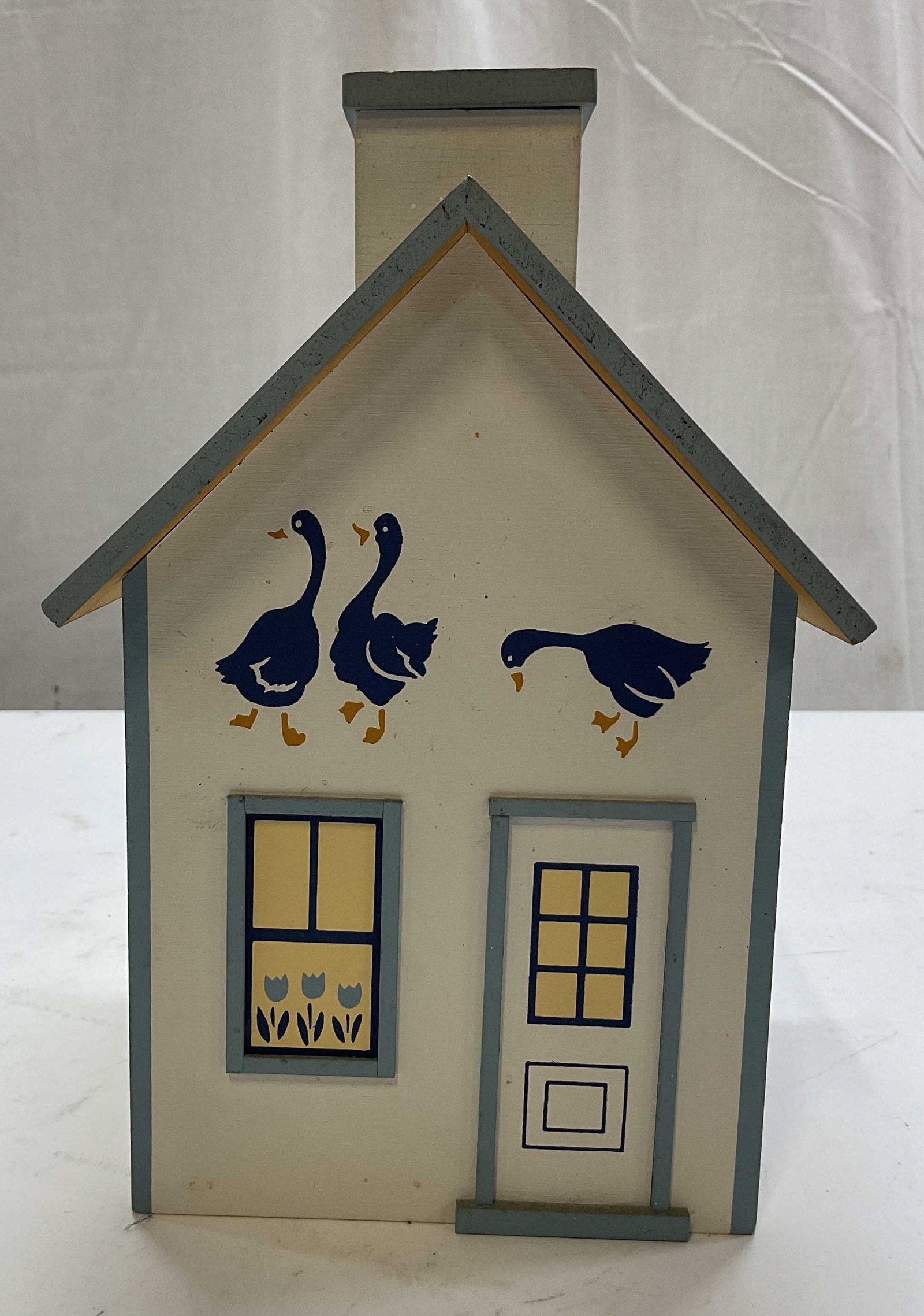 1967 SGND Vintage Decorative Wooden House: Vintage decorative wooden house. Signed, reads illegible, dated 1967. House shape with chimney. Hand painted duck motifs and cottage style windows and door details. Varying colors. Measures approx 5