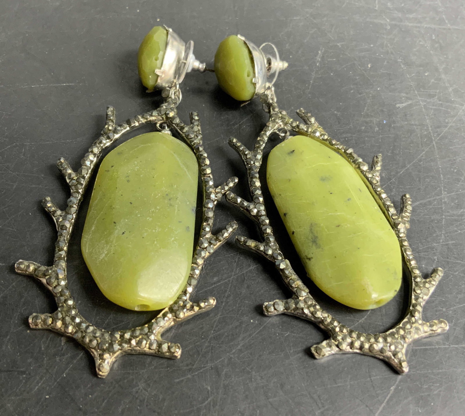 SIMAN TU Green Jade Crystal Dangle Earrings 4 in: SIMAN TU Vintage Statement Dangle earrings featuring a large pale green polished jade stone, which swings and dangles separately, set within a textured branch like frame accented with pave crystals,