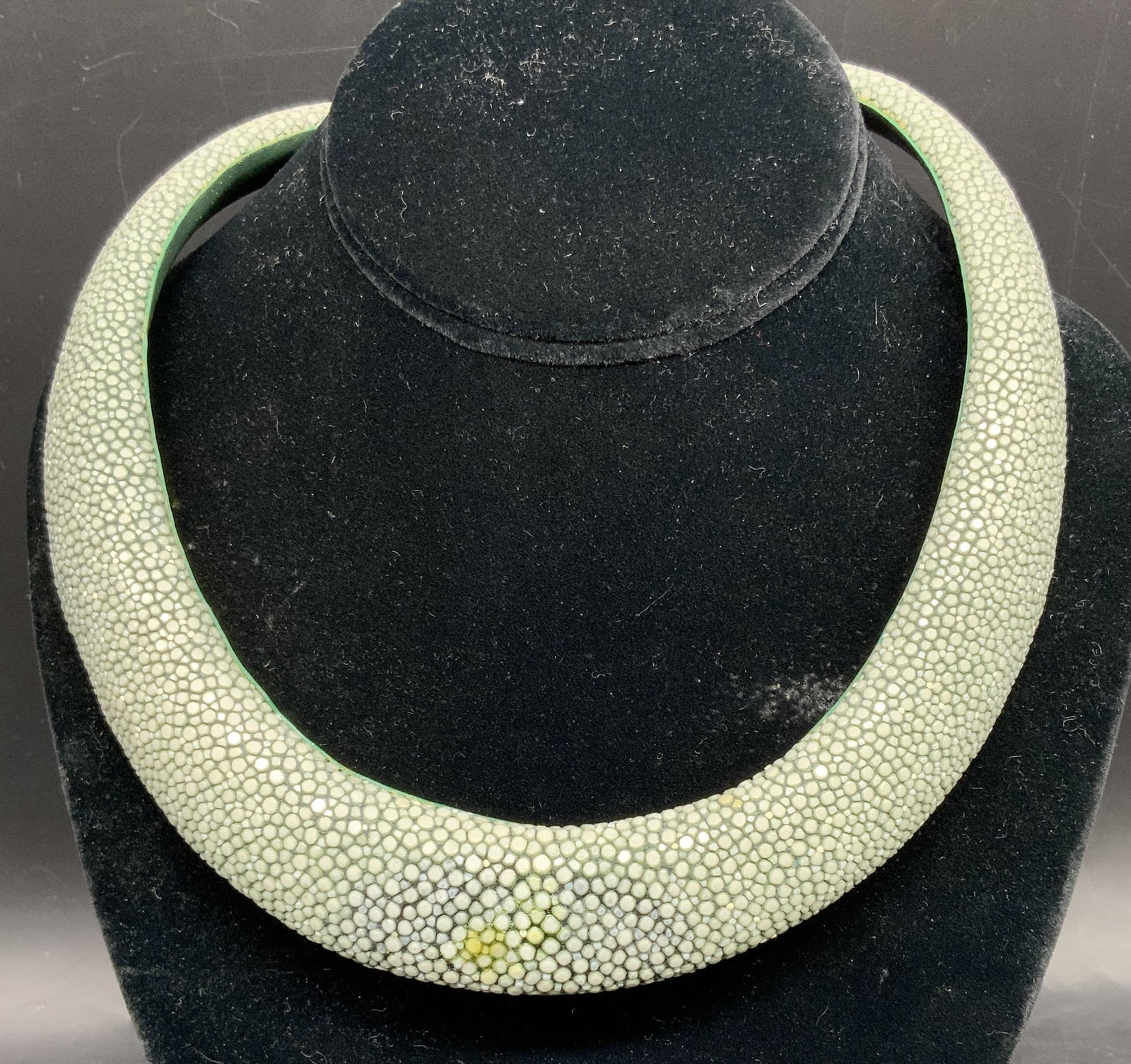 Shagreen Stingray Leather Collar Necklace: Shagreen collar necklace crafted from genuine stingray Skin, Galuchat, and features a distinctive pebble like texture natural to stingray leather, light sage green hue, yellowish blemish at center,