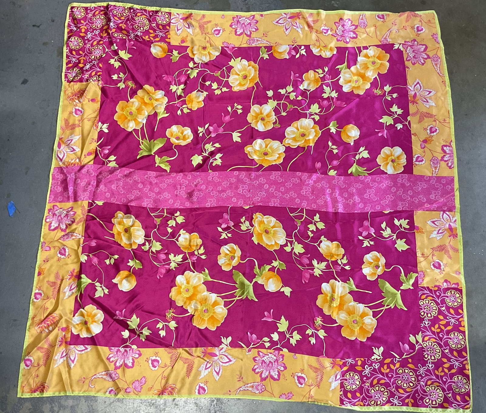 Echo Orange & Pink Floral Silk Scarf Korea: Echo orange and pink floral silk scarf. Printed in Korea. 100% silk. Various floral motifs in orange, pink, yellow, white, and green. Measures approx 34 x 34 inches. Wear consistent with exposure. Sca