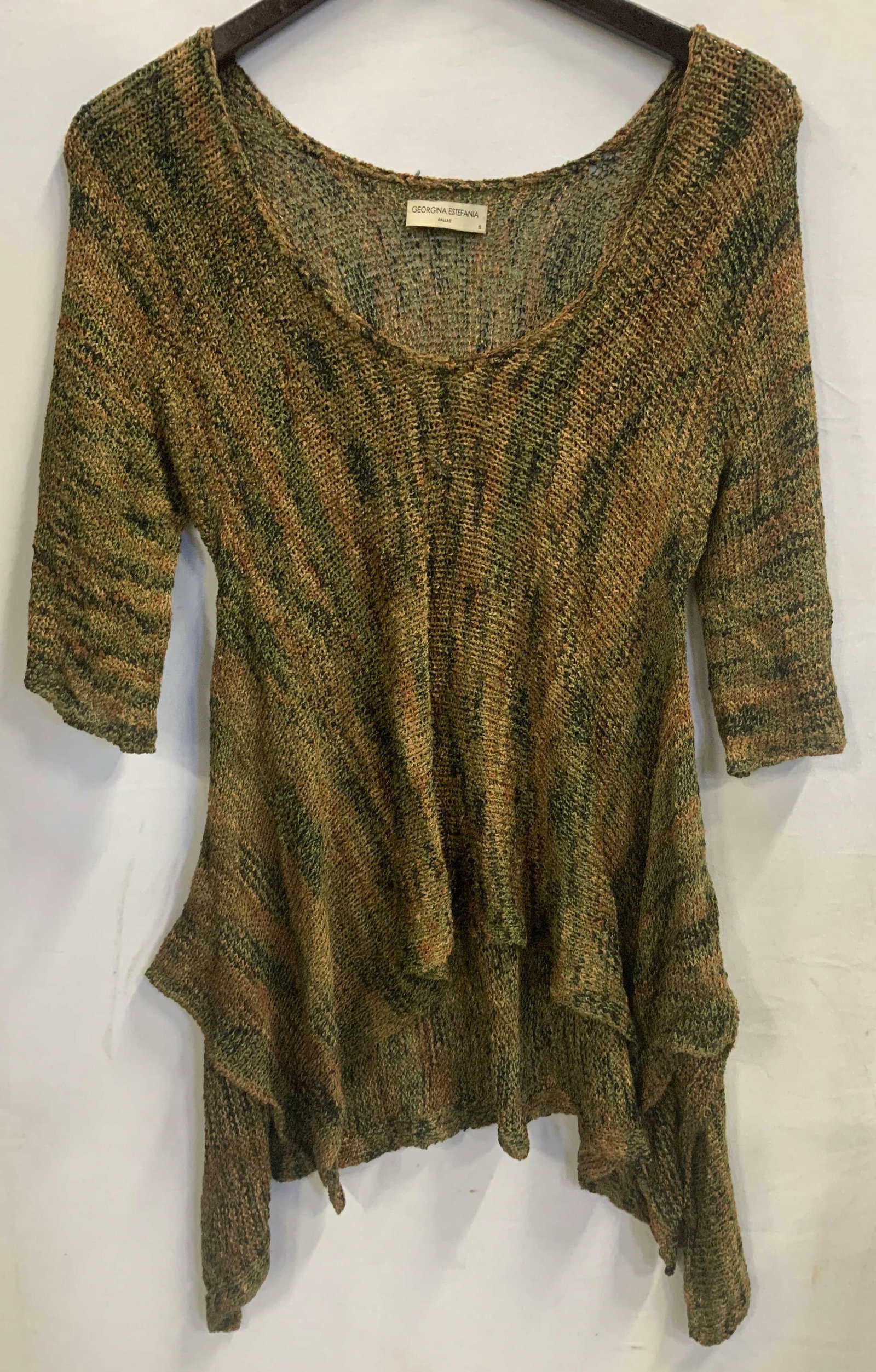 V Georgina Estefania asymmetrical sweater, USA: Vintage Georgina Estefania asymmetrical drape sweater. Hand made in the USA from 100% rayon. Size small. This piece is cut as an asymmetrical high low top. It features a draped uneven hemline that