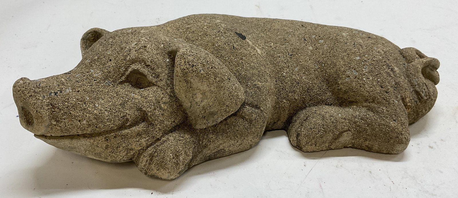 Vintage Concrete Pig Garden Statue: Vintage concrete pig garden state. Pig figure in a laying down position. Carved details and features. Piece has weight. Measures approx 8 x 12.5 inches. Surface wear consistent with exposure. Pig gard