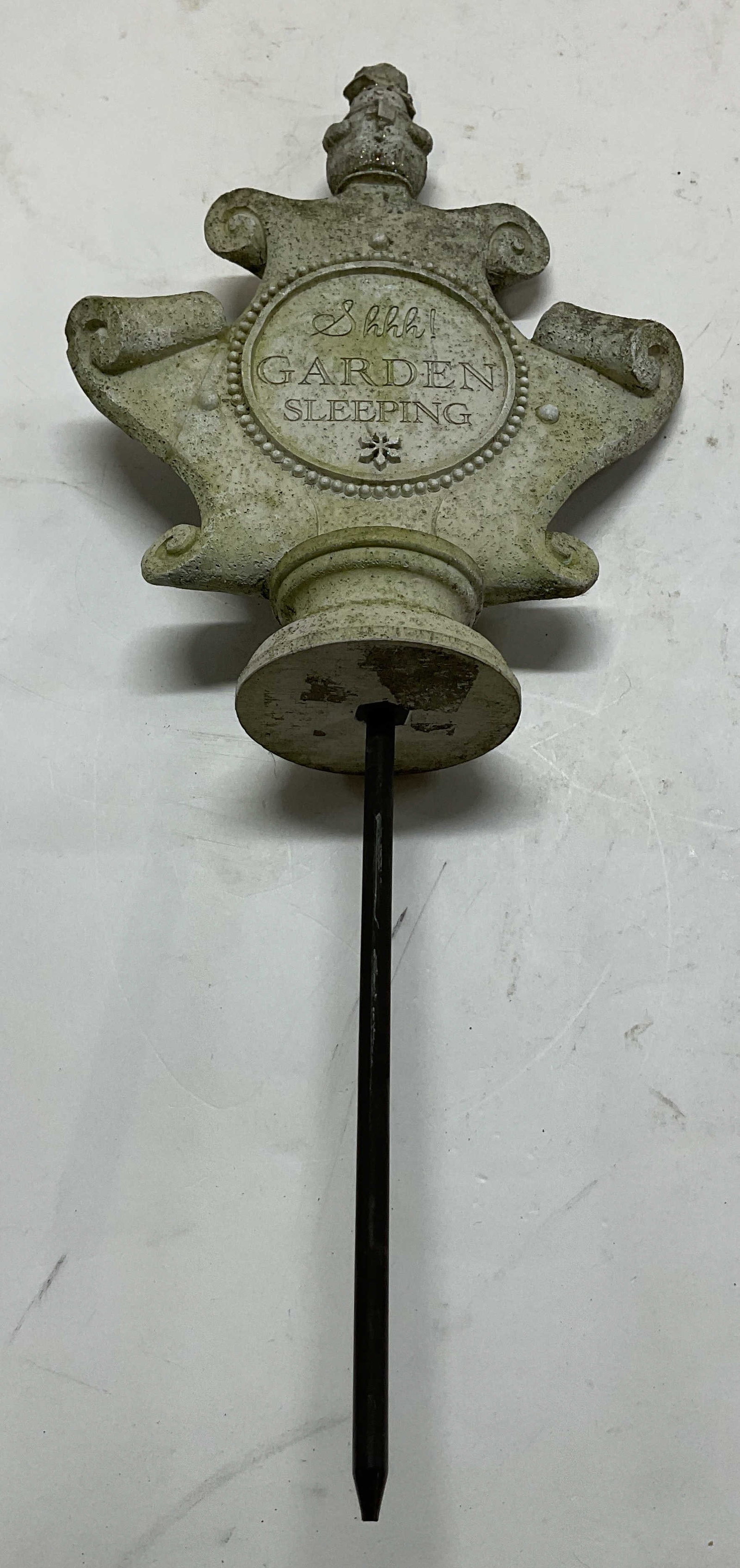 Vintage Shhh Garden Sleeping Garden Stake: Vintage Shhh Garden Sleeping garden stake. Composite material. Attached ground stake. Surface reads Shhh! Garden Sleeping with ornate scroll design, snowman finial and snowflake motif. Glitter
