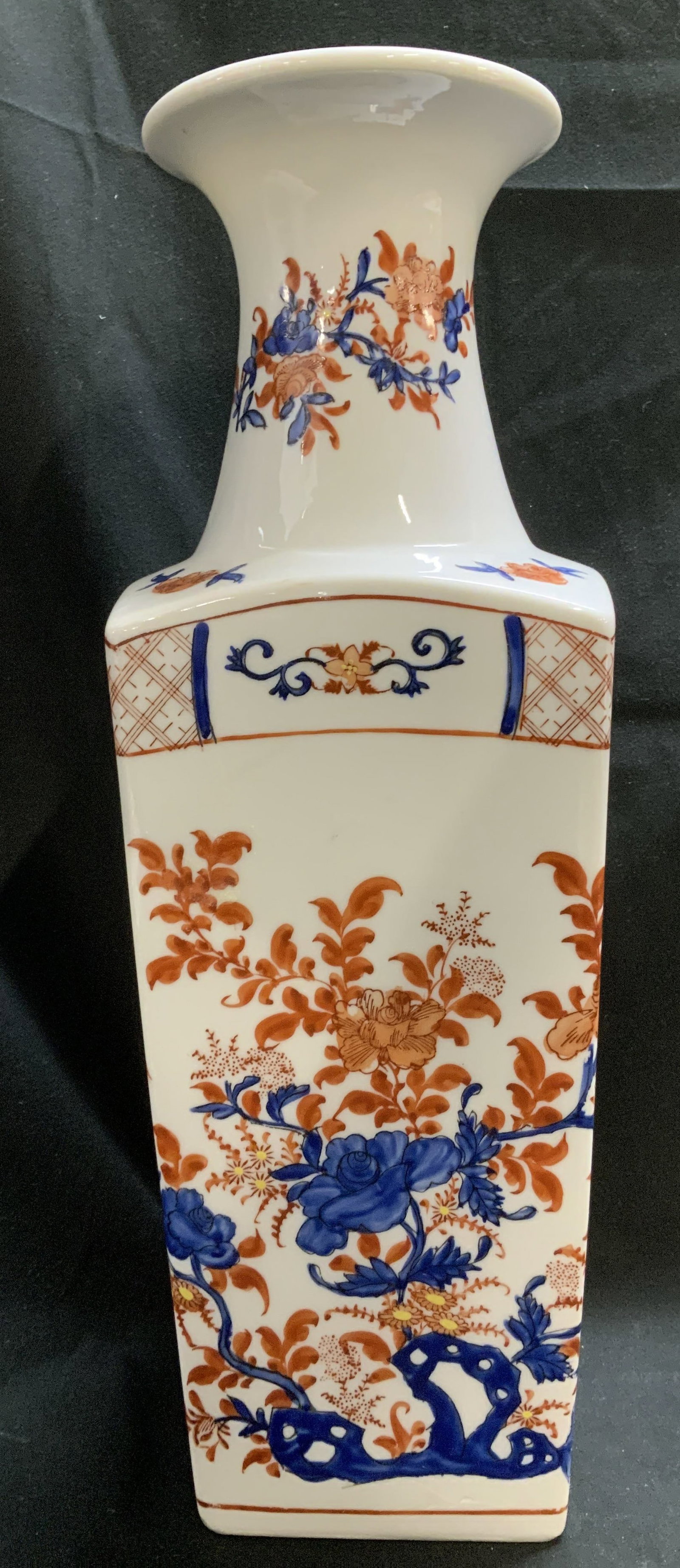 Vtg Japanese Decorated Porcelain Vase HONG KONG: Vintage Japanese porcelain vase features decorated red & blue floral motifs. Square shape. Small neck. Signed & marked. Reads, JAPANESE DECORATED IN HONG KONG. PORCELAIN WARE. Surface wear consistent 
