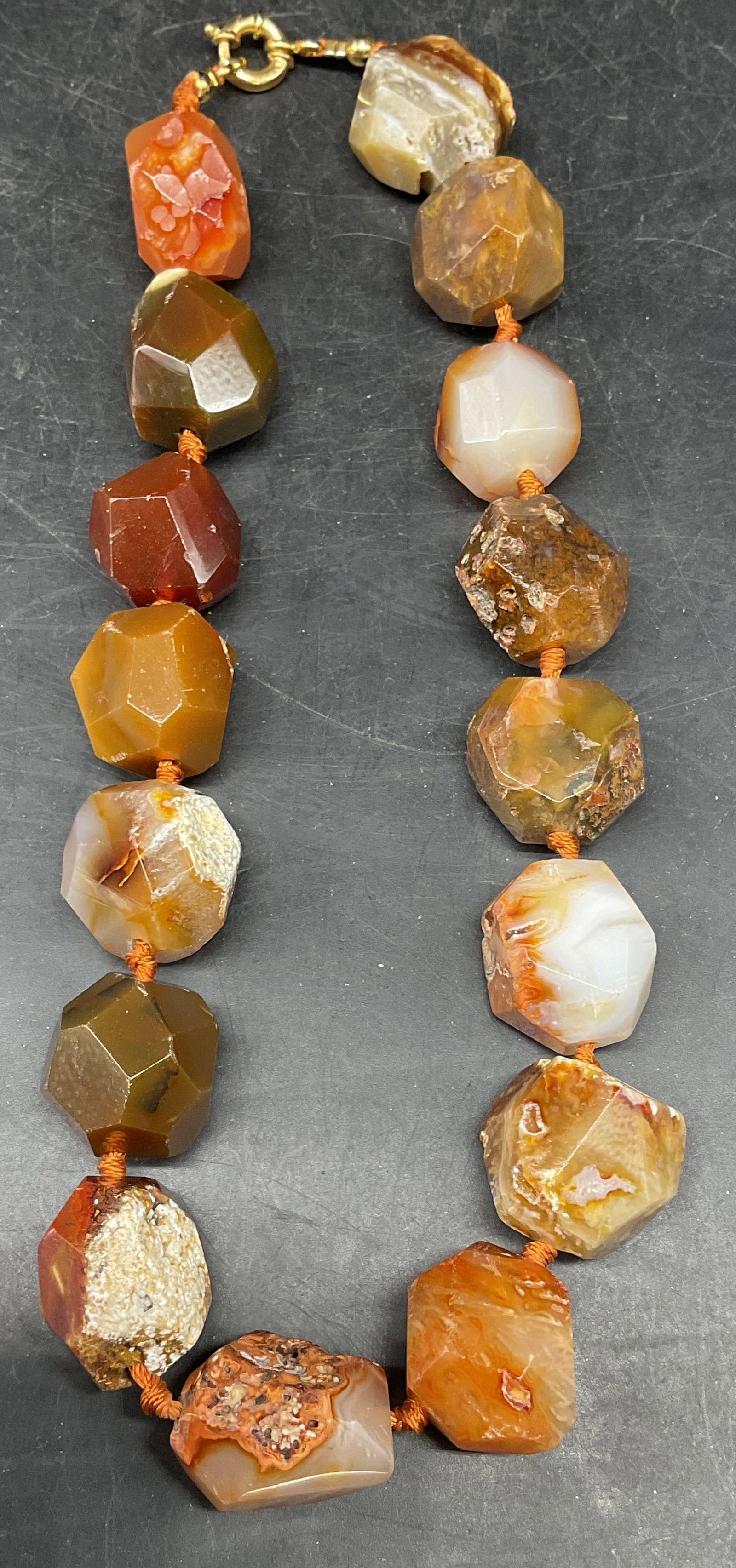 Vintage Orange Agate Beaded Necklace: Vintage chunky faceted orange toned banded agate beaded necklace. Drop length 8.5 inches. Some scratching. Jewelry, estate jewelry, fine jewelry, cocktail jewelry, fashion jewelry, accessories,