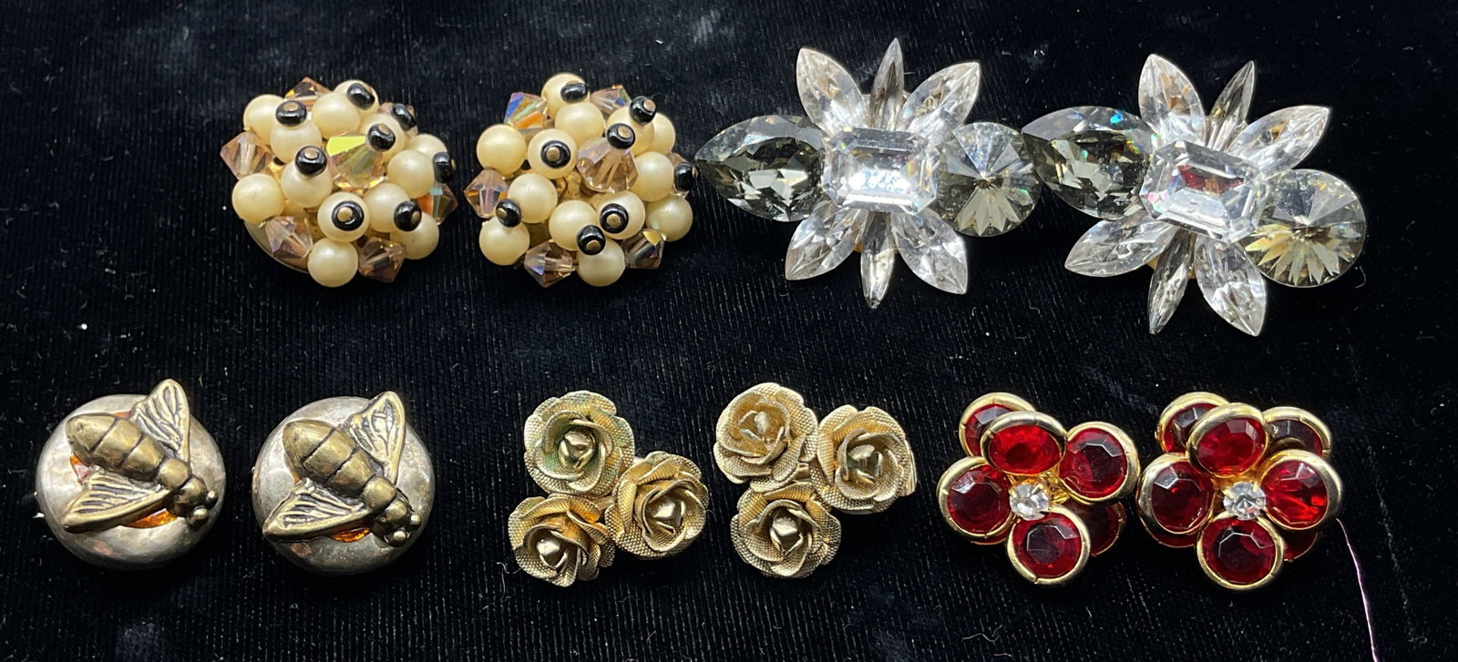 Lot 5 Vintage Assorted Gold Toned Earrings: Lot of 5 vintage assorted gold toned earrings. Clear glass beads and rhinestone cluster floral earrings. Red and clear rhinestone and glass beads cluster floral earrings. Pearl style with clear and bl