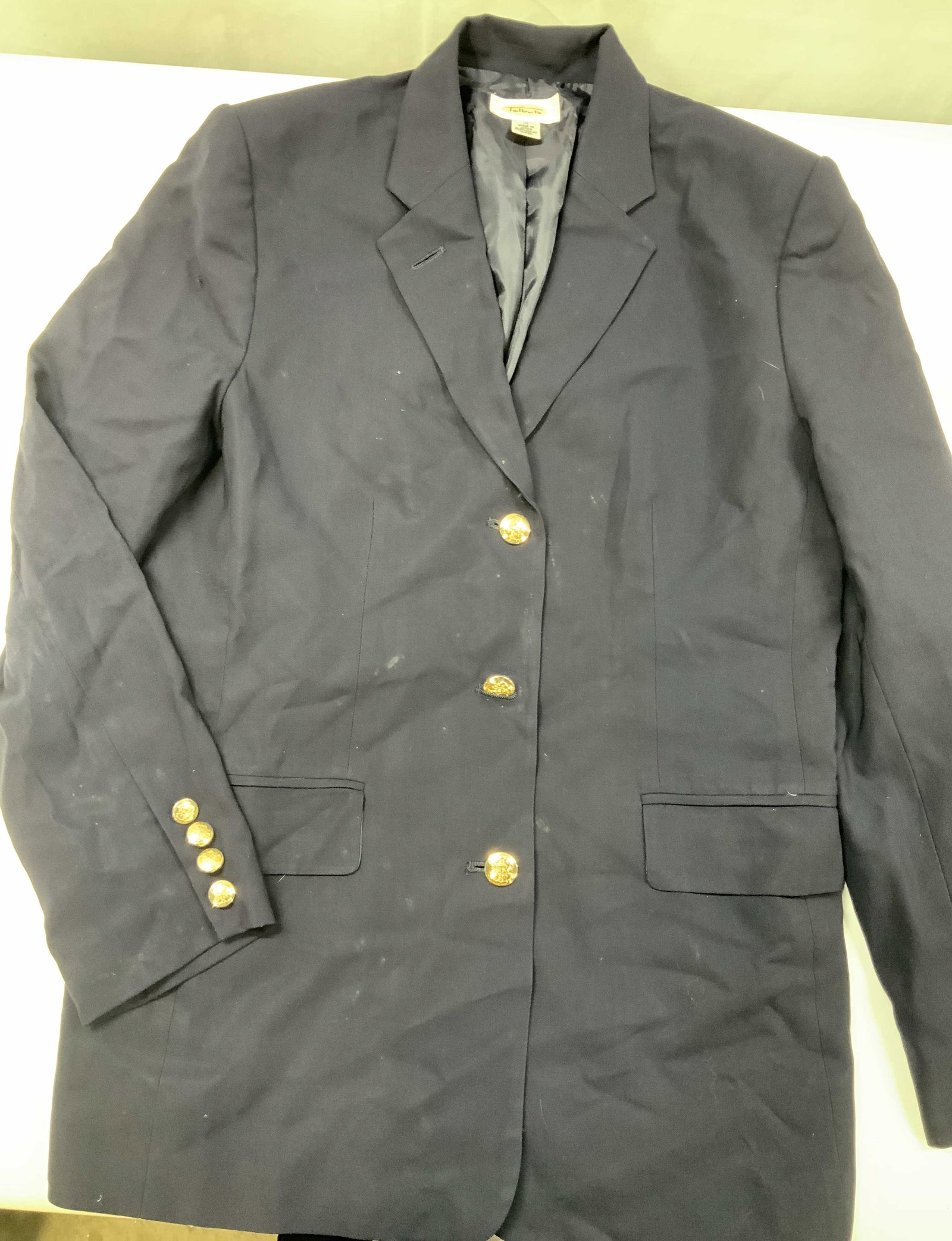 Vntg Talbots navy blazer with crest buttons, Japan: Vintage Talbots navy blazer with crest buttons. Made if 100% wool in Japan in size 10. It features a boyfriend straight cut silhouette. The defining element is the polished gold toned crest embossed b