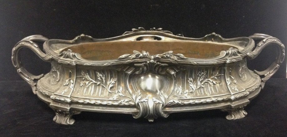 Antique Victorian Silver Plate Center Piece: Large ornate centerpiece with baroque & neo classical design elements. Height 4 inches. Width 17 inches. Depth 7 inches. Property of a South Salem, NY home.