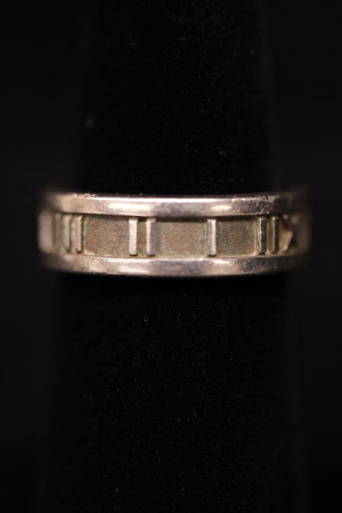 Contemporary Sterling Tiffany & Co. Atlas Ring: Marked for Tiffany & Co, Sterling and dated. In original dust cover bag.
