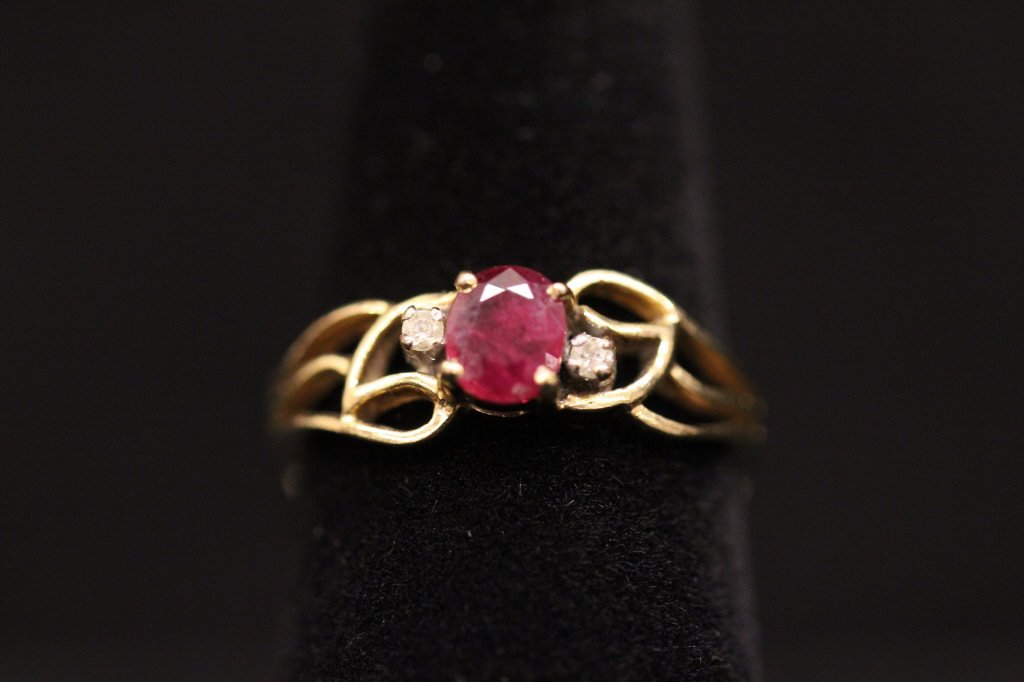 Vintage Yellow Gold & Diamond Ring: Open scrollwork motif. Hallmarked for 14kt gold. Approximately 1.6 grams inclusive.