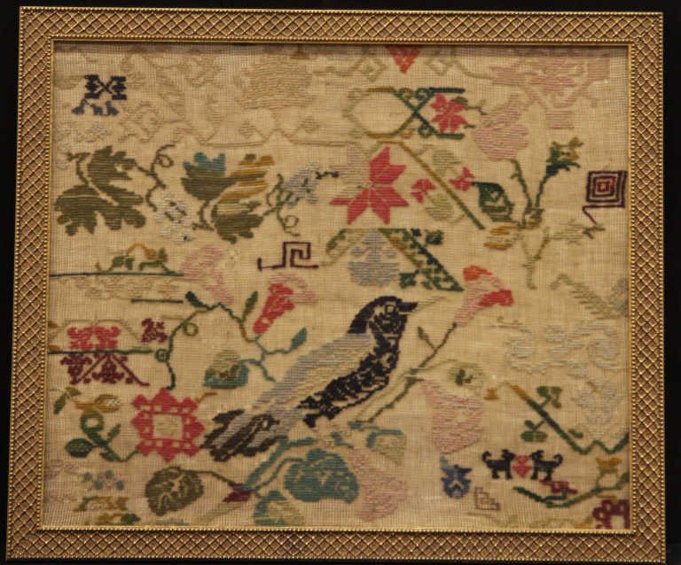 Antique Early American Style Framed Sampler: Measures 18 inches by 22 inches.