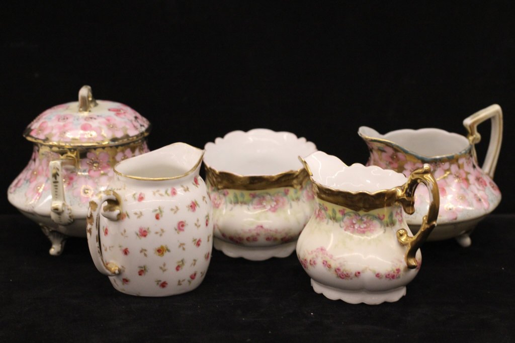Assorted Antique Nippon & Limoges Sugar & Creamers: Matching set of hand painted Nippon. Matching set of hand painted & decal Limoges, & one Limoges creamer. Largest piece height 5 inches, width 6 inches.