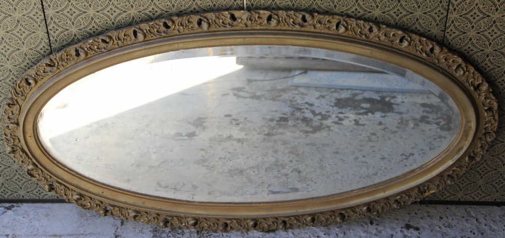 Antique Victorian Oval Gilt Mirror: Measures 45 inches by 25 inches