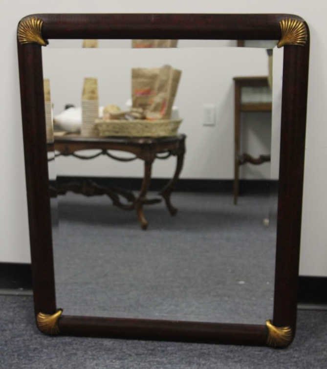 Gilt Seashell Motif Carved Wood Frame Mirror: Measures 32 inches by 25 inches.