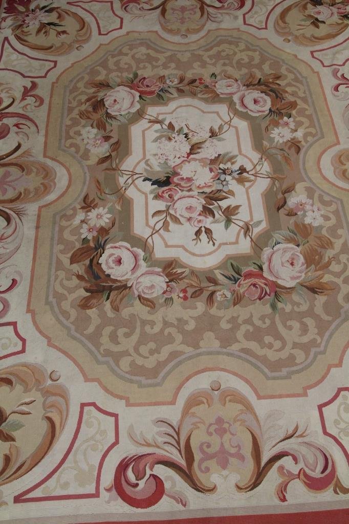 Antique French Aubusson Style Tapestry Carpet: Includes custom under pad. Measures 12 feet by 8 feet 8 inches approximately. All over rose & floral motif w/ scroll work design.
