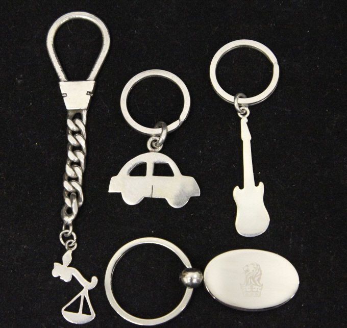 Sterling Silver Keychains: Sterling silver guitar keychains, 7.0 DWT of .925 silver sterling silver automobile keychains, 12.6 DWT of .925 silver, sterling silver keychain with scale charm 13.6 DWT, stainless steel keychain wit