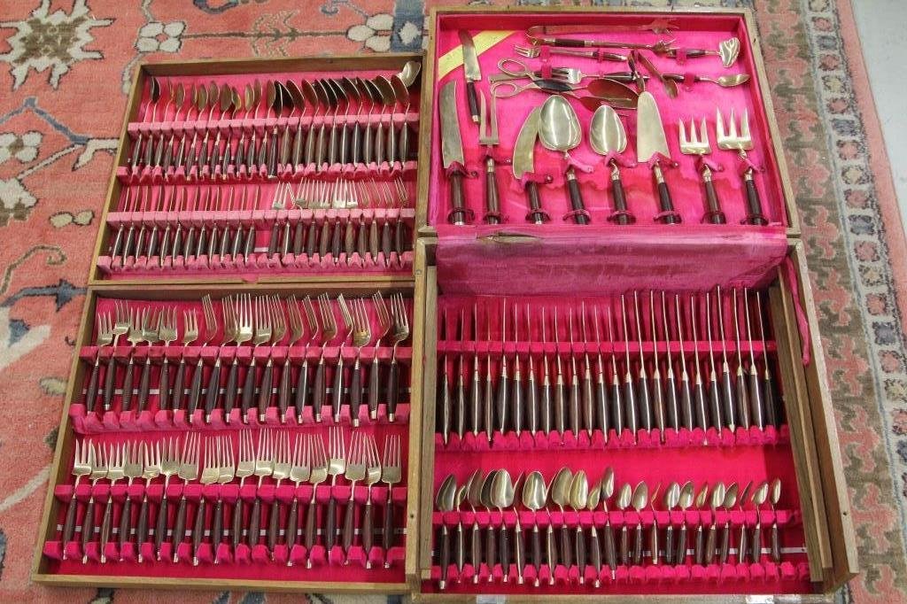 Large Asian Rosewood & Brass Flatware Service: In original case, with four levels of flatware and serving pieces.