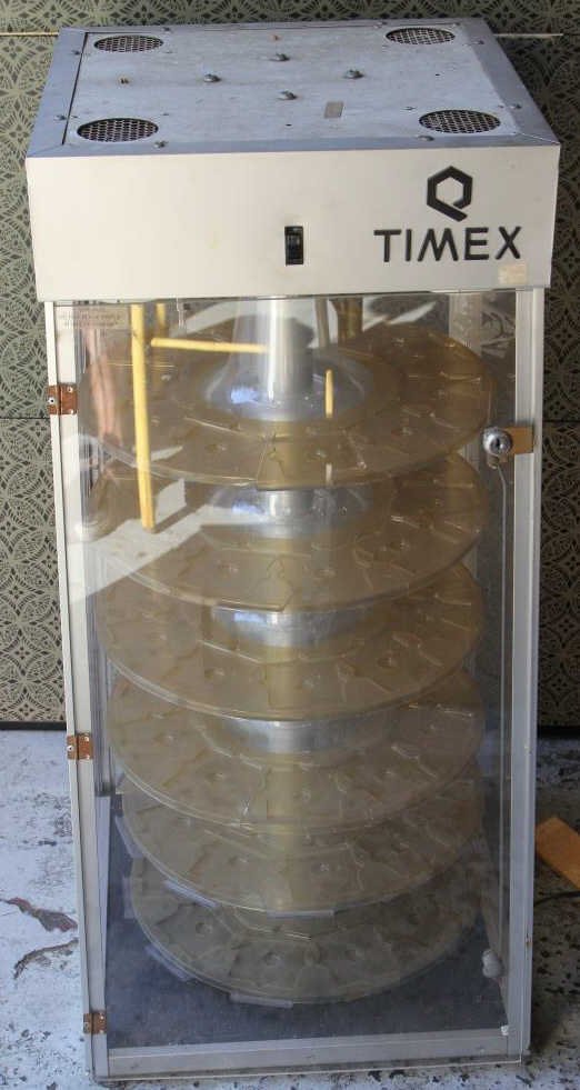 Vintage Timex Watch Store Counter Display Case: Height 39 inches. Width 16 inches. Depth 16 inches.