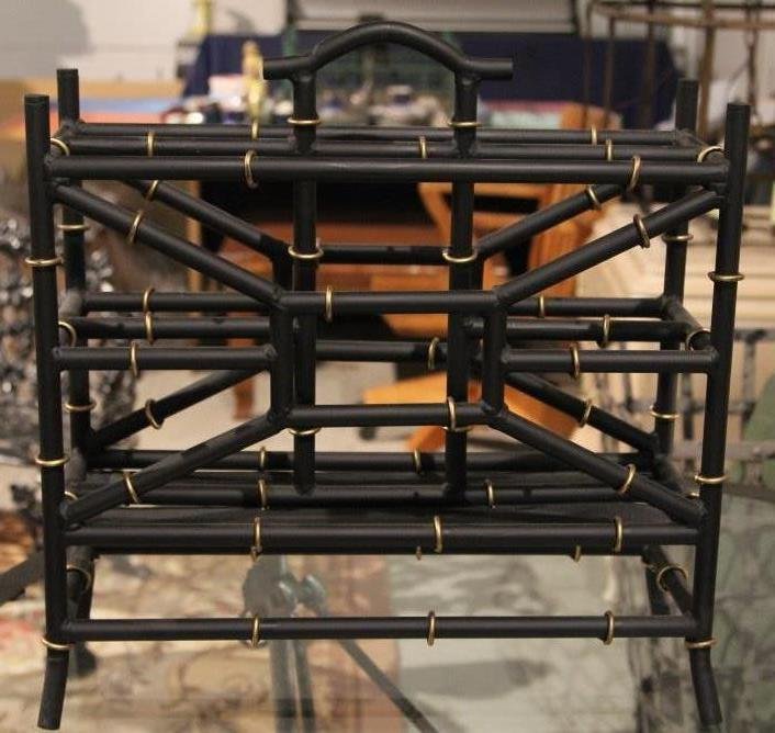 Contemporary Bamboo Motif Magazine Rack: Black and gold finish. Height: 20 inches. Width: 19 inches. Depth: 8 inches
