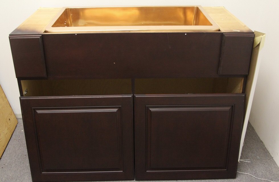 Signature Hardware Copper Sink & Cabinet: Copper farm sink, new in box. Custom made cabinet to fit. Cabinet measures 35 inches in height, 48 inches in width, 25 inches in depth