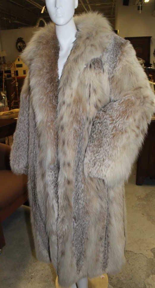 Full Length Larry Weinstein Silver Fox Jacket: Shoulder to wrist 24 inches. Shoulder to floor 41.5. Silk Lining. Tag fo Larry Weinstein.