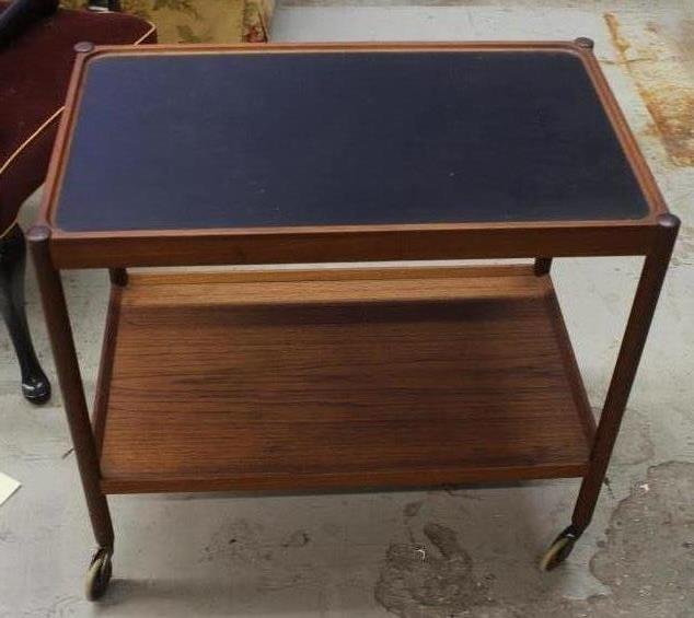 Pontoppidan, Ludvig. Vintage Mid Century Teak Barcart: Center of shelves black accented with teak. Signed on bottom L. Pontoppidan.Label reads " Made in Denmark". Height 25 inches, width 28 inches, depth 17 inches