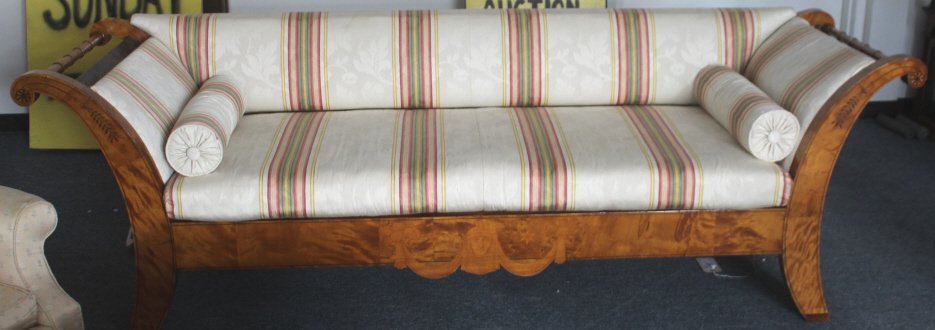 Antique Austrian Biedermeier Sofa: Newly Upholstered. Ornate wreath and face inlay on front apron. Late 1800's. Height 31.5 inches. Lenth 94 inches. Depth 32 inches.