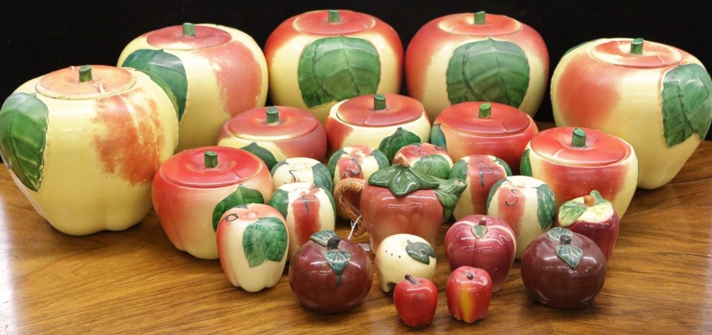 Vintage Porcelain Apple Jar Collection: 5 cookie jars, 5 smaller jars, 1 teapot , 6 salt & peppers. Tallest measure 8.5 inches by 8.5 inches. From Scarsdale, NY estate.