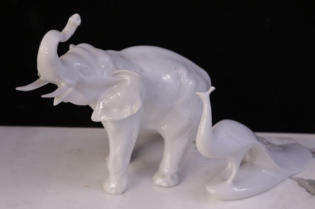Assorted Porcelain Animal Statues: Elephant Royal Dux. Peacock Royal Dux. Height of tallest 10 inches. From Scarsdale, NY estate.
