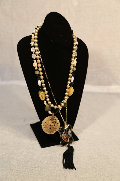 4 Asian Vintage Necklaces: 1 Cloisonne & enamel with tassel on chain. Multi stone with carved Asian dragon pendant. Brushed gold toned bead necklace on chain. Longest measures 14 inches.