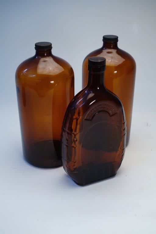 Group of three vintage large amber medicine bottle: 19" high