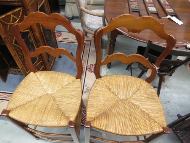 Pair French Country Stools: Scalloped ladder back French country For bar height or counter height. Rush seatsexcellelnt condition. Height 41 inches. Width 18 inches. Depth 16 inches. From a Ridgefield, CT estate.