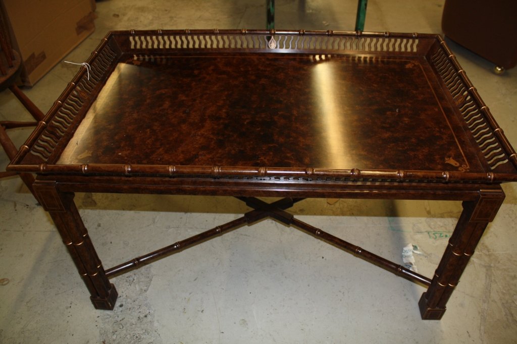 Mario Buatta for John Widdicomb Coffee Table: Burled wood design with gilt deocration & faux bamboo styling. Plaque for Mario Buatta for John Widdicomb. Custom made. Retails at $4,800. Length 3 feet 2 inches. Depth 24 inches. Height 21 inches.