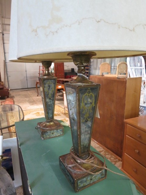 Antique mirrored mercury glass lamps: Pair of lamps originally purchased at GREENWICH ANTIQUES Painted wood tops and bases, brushed gold, and painted mirrored mercury glass faceted columns. Each is 30 inches high Glass painted with gold d