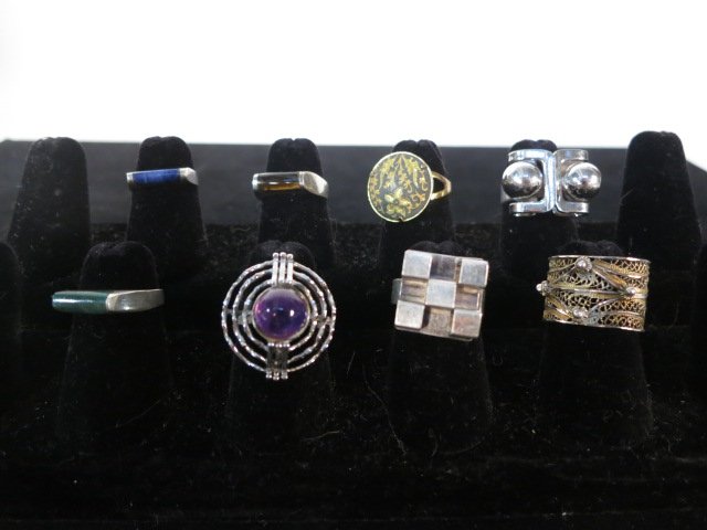 8 Vintage Silver Rings: 8 vintage rings. Three marked for Mexican Silver. One marked 800 silver, two marked 925 Sterling.