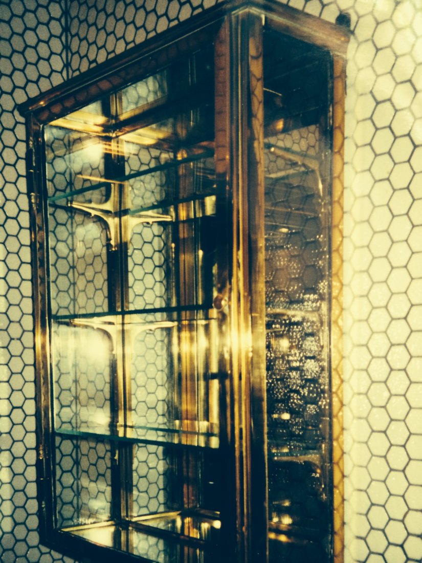 Unusual Victorian Brass and glass vitrine: Unusual Continental Victorian Brass and glass Vitrine Cabinet with brass trimmed glass and mirror shelving. All glass sides trimmed in brass, Wall hanging Display Curio cabinet. Appraised and insured 