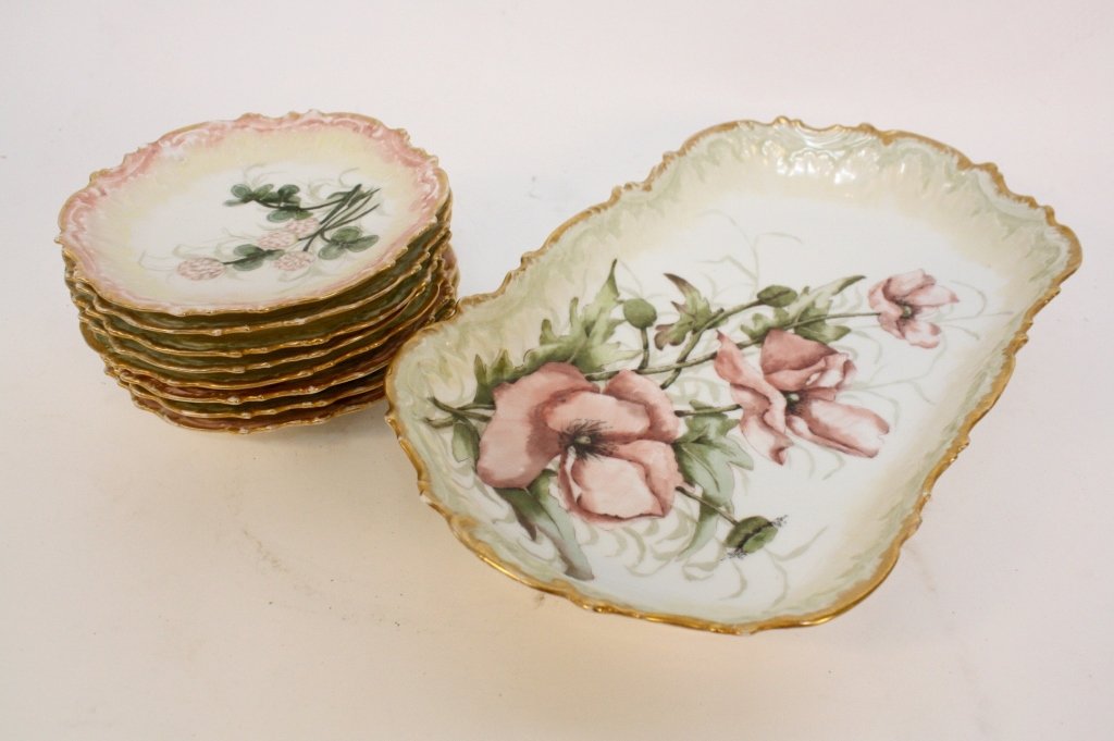Hand painted set Limoges platter 10 dessert plates: Antique hand painted set of ten limoges plates, each with different floral pattern and gilded scalloped edges, hand painted and gilded floral pattern platter. Each marked France and Limoges in star sh