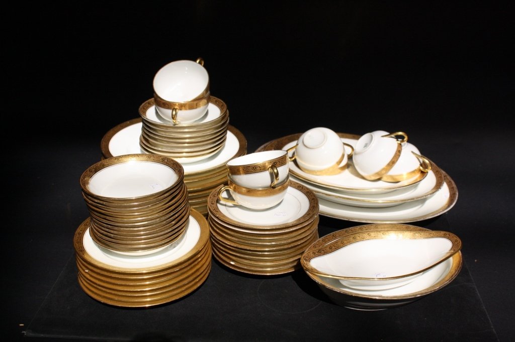 BERNARDAUD LIMOGES French Porcelain dinner set: Fine China Dinner set of French porcelain each marked on back B&C Limoges France, L. Bernardaud & Co, Limoges. Twenty two carrot gold edged border with bright white centers. Set includes eight dinner