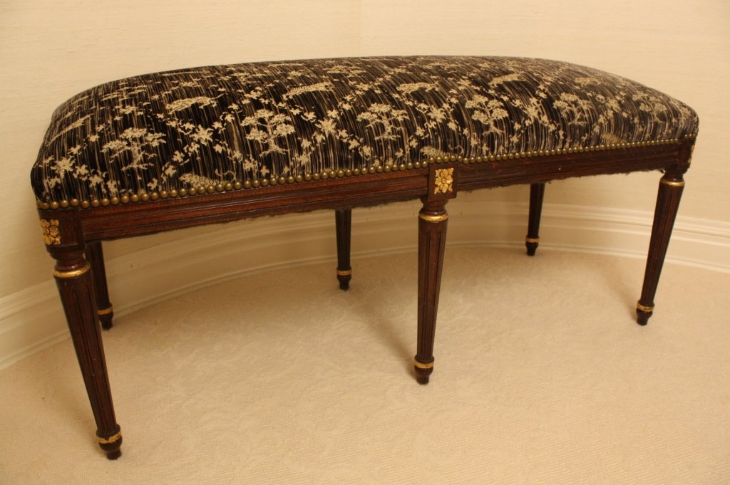 STARK FINE FURNITURE Louis upholstered bench: Carved wood Frame Bench with Animal Print cut velvet upholstery from Stark Fabric..The Louis bench is in Excellent Condition. Measures 18 inches deep, 21 inches high, 41 inches long. Property of a Bed