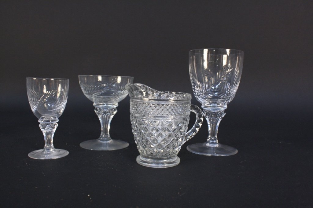 27 Piece Set Cut Crystal Stemware Leaf Pattern: 27 Pieces of Cut Crystal stemware includes 9 water glasses, 8 red wine glasses, 10 white wine glasses. All in excellent condition.