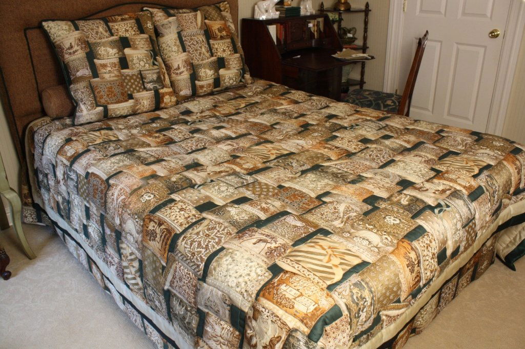 BRUNSCHWIG&FILS custom Queen bed Quilt and skirt: Hat box Pattern and custom quilted around hatboxes, bed spread made for queen Bed. Trimmed with Green satin stripe two inches and two inches of beige satin. Comes with large matching European style th