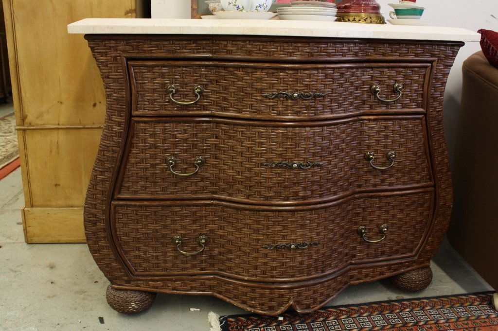 WHITECRAN cane chest of drawers Carved marble top: Braided cane chest of drawers or commode with carved marble top. Serpentine front. Marble top has ogee edges. Inside drawer marked whitecran. Three drawers bun feet. Measures 25 inches deep. 41 inches