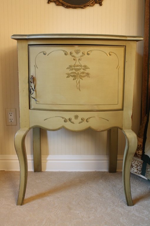 Hand painted French style night table: Country French Style Painted Green night stand. Cabriole legs, Bow front, Scalloped and ogee edge to top. Single cabinet door. measures. 24 x 21 x 34. Property of a Bedford Estate.