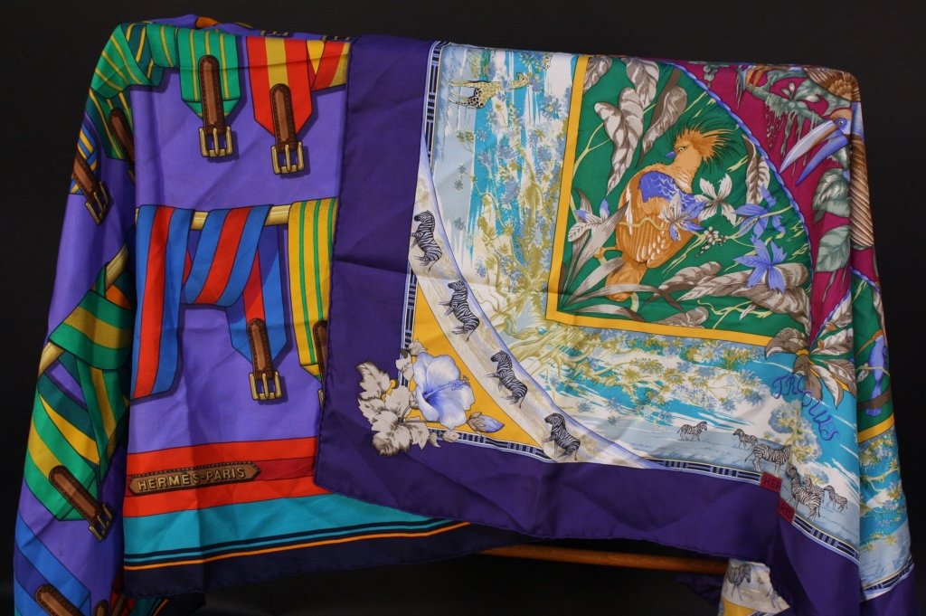 TWO VIntage HERMES Scaarves in Gem Colors: Both Signed for Hermes, royal blues, plums, Greens, Reds, Teales, Aquas, First Titles TROPICUS with zebras, Tucans and palm froinds, Second Colorful Horse bridles and gear. Each measures 36 inches squ