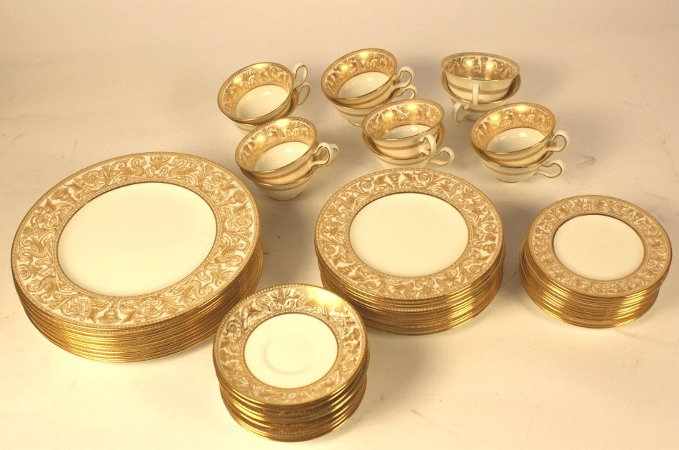 WEDGWOOD White and Gold Bone China Set: Dinning Service set for 12. Includes all dinner plates, salad plates, butter plates, tea cups and saucers. Numbered set 4219. Mint condition. Property of Westport, CT Estate.