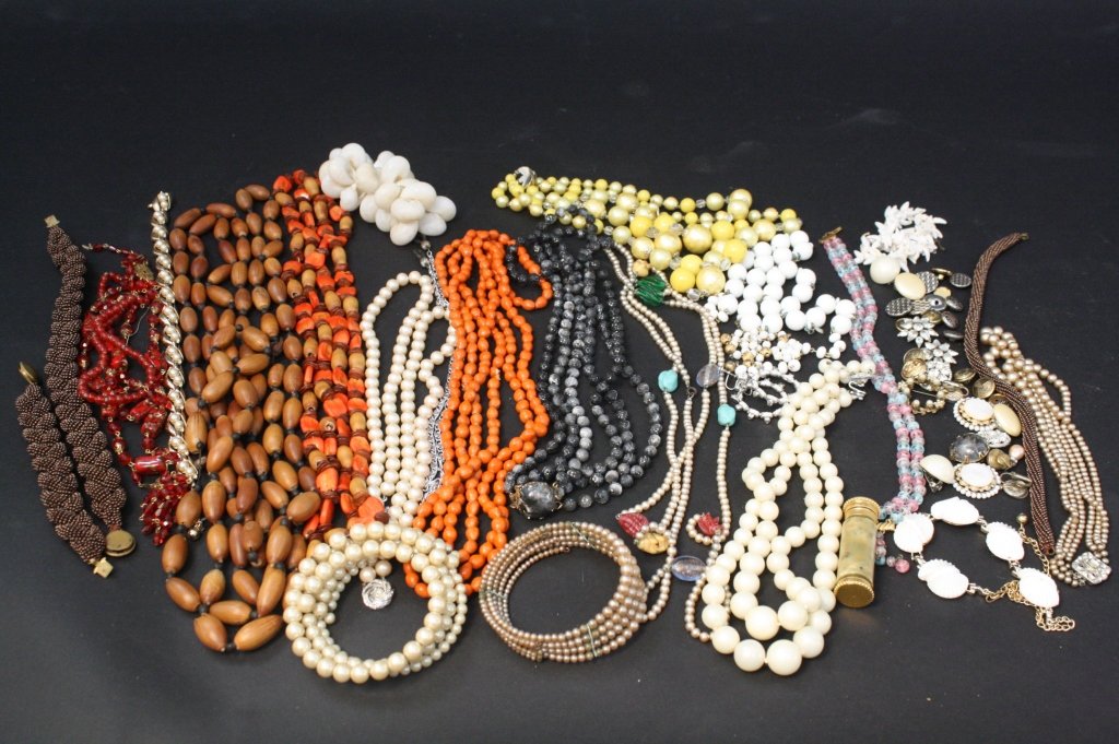 Group Lot Vintage Costume Jewelry: Vintage costume Jewelry group lot. Group includes app 9 necklaces 11 bracelets, antique perfume container , includes crystals beads, mother pf pearl, faux pearls, rhinestones and more.