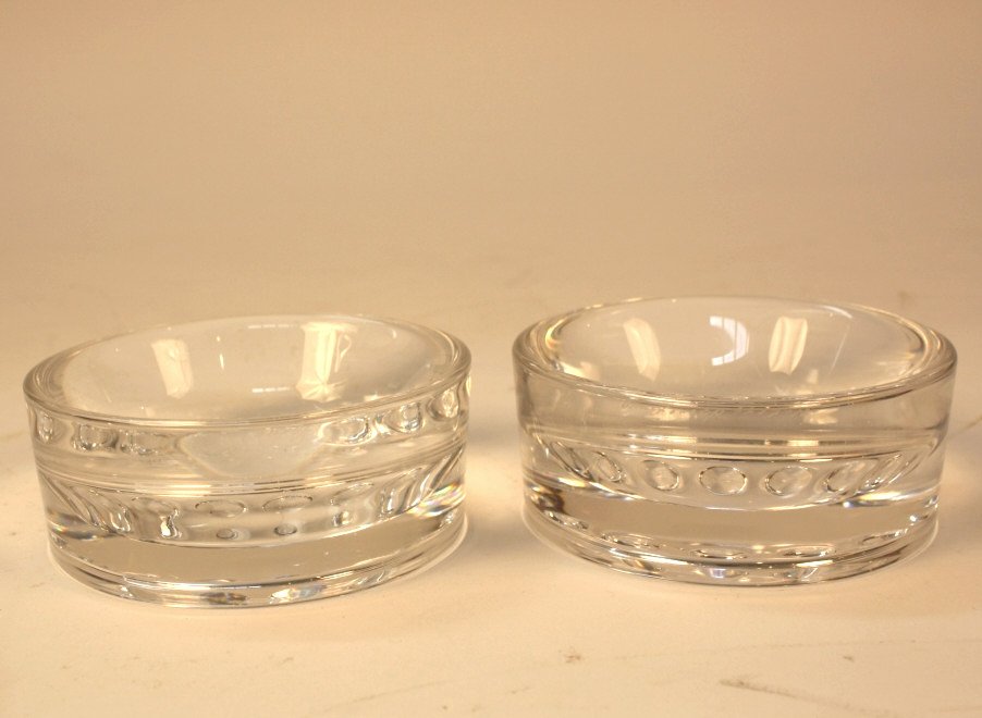 Two ORREFORS Wine Coasters or Candy Dishes: Signed and numbered. Round cup plates. Measures 4.5 inches wide.